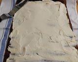 A picture of step 13 of Classic Pumpkin Roll.
