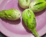 A picture of step 1 of Multigrain Atta Brinjal & Curd Thalipith.