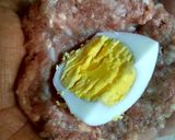A picture of step 2 of Meatballs Stuffed with Hard-Boiled Egg.