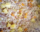 A picture of step 6 of Carrots and potatoe rice.
