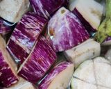 A picture of step 2 of Brinjal Potatoes Masala curry(Eggplant curry).