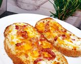 Une image de l'étape 6 de Tartines bruschettas crème lardons gruyère râpé parmesan ou cheddar et champignons.