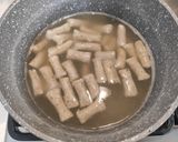 Foto del passaggio 5 della ricetta Gnocchi di tofu al grano saraceno ed erbe aromatiche con ragù di funghi, asparagi e noci