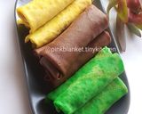 A picture of step 5 of Flavoured Rolled Crepes with Toasted Coconut Filling.