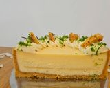 A picture of step 59 of Piña colada cheesecake (with a pineapple insert inside the cheesecake).