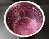 A picture of step 1 of Black Grape Smoothie.