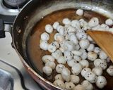 A picture of step 2 of Makhana revdl sesame seeds coated (til).