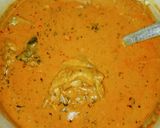 A picture of step 7 of Banga soup with fresh cat fish and beef.