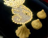 A picture of step 4 of ROSTED CHANA DAL & SESAME SEED LADDU.