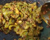 A picture of step 3 of Besan simla mirch ki sabji.