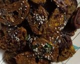 A picture of step 6 of Homemade crispy Patra with some spicy green chutney.