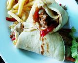 Foto del paso 3 de la receta: Wrap de pollo con papas fritas al horno