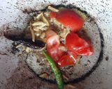 A picture of step 3 of Lasooni Dal Palak with Gondhoraj lebu/ lemon.