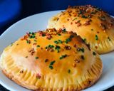 A picture of step 9 of Whosaynas Baked Chicken Naan.