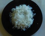 A picture of step 2 of Rice with coconut and radish.