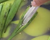 A picture of step 1 of Bharwa bhindi in dahi kadi.