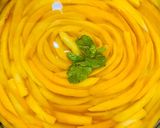 A picture of step 11 of No bake Mango Cheese Cake.