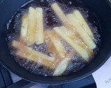 Foto del paso 5 de la receta: Pimientos asados rellenos de patatas fritas y huevos fritos