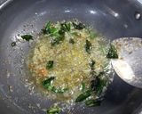 A picture of step 1 of Prawns onion tomato masala.