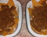 Foto del paso 2 de la receta: Nachos con carne rallada y queso