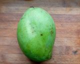 A picture of step 1 of Mamidikaya pulihora or mavinakayi chitrana / Mango rice.