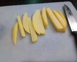 A picture of step 1 of Masala French fries.