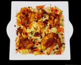 A picture of step 15 of Chicken Tikka masala with bukhari rice.