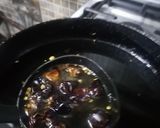 A picture of step 8 of Curry pakora in green and with red Chilli tarka.