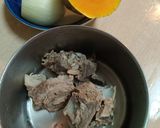 A picture of step 1 of Onion Pumpkin Pork Rib Soup.