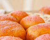 Une image de l'étape 10 de Beignets fourrés à la crèmes pâtissière et saupoudrés de pralines roses.