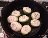 A picture of step 6 of Bhat karela pur with white sauce.
