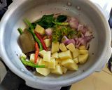 A picture of step 2 of Masala Bhat.