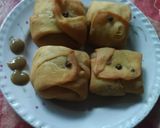 A picture of step 9 of Chicken samosa parcels.