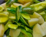 A picture of step 1 of Potato & Pointed Gourd Curry.