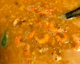 A picture of step 8 of Lentil Oats Porridge with Tomatoes and Prawns.