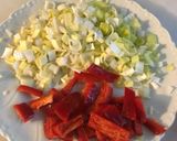 Foto del paso 4 de la receta Paella de habitas, ajos tiernos y albóndigas