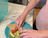 A picture of step 6 of Veggie wraps.