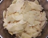 Foto del paso 2 de la receta Tortilla cuajada de patatas, ajos, perejil y jengibre
