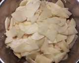 Foto del paso 2 de la receta: Tortilla cuajada de patatas, ajos, perejil y jengibre