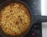 A picture of step 5 of Mala Beef Tomato Noodles.