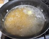 A picture of step 1 of Broccoli Shrimp Alfredo Pasta.