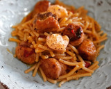 Foto del paso 10 de la receta: Fideos con butifarra, costillas, calamar y piquillos