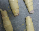 Foto del paso 5 de la receta: Croasanes de hojaldre con jamón y queso