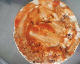 A picture of step 3 of Chapati pizza /thìn crust pizza.