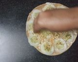 A picture of step 3 of Sandwich pizza from leftover Roti.