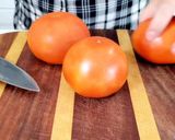 A picture of step 1 of Grilled Tomatoes with cheese.