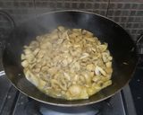A picture of step 1 of Mushroom curry.