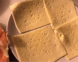 Foto del paso 1 de la receta: Rollitos de tortilla rellenos de jamón y queso
