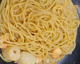 A picture of step 12 of Garlic Sautéed Scallop and Shrimp Pasta.