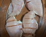 A picture of step 2 of Chicken Breast with Cheese and Tomato.